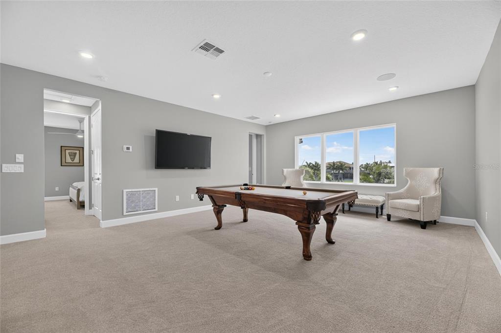 Upstairs family loft with lagoon views at 825 Manns Harbor Drive
