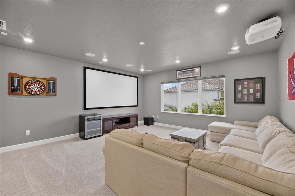 Home theater room at 825 Manns Harbor Drive, MiraBay