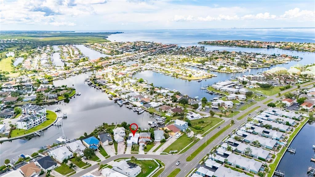 Aerial view of 918 Shagos Drive and the canal